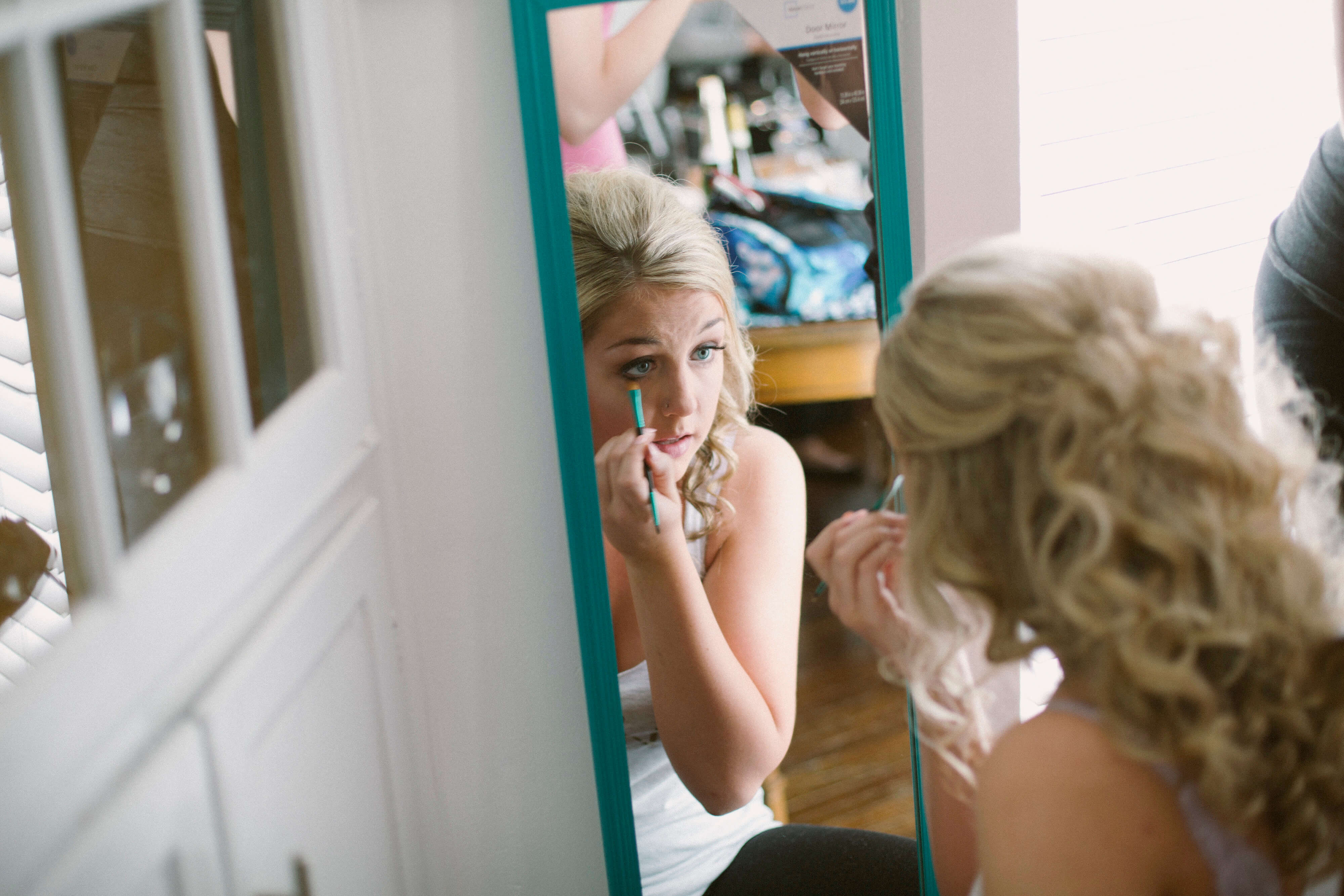 wedding makeup in mirror